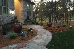 Custom planter boxes and flagstone entry