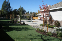 Artificial turf and patio cover near contemporary pool