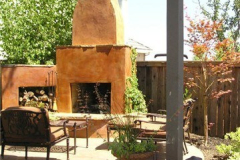 Rustic fireplace and wood bin