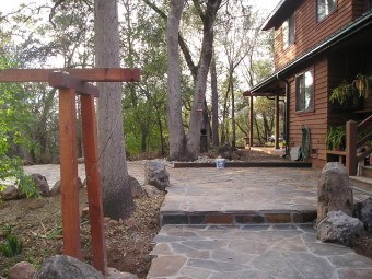 New flagstone path and steps create strong vertical and horizontal lines