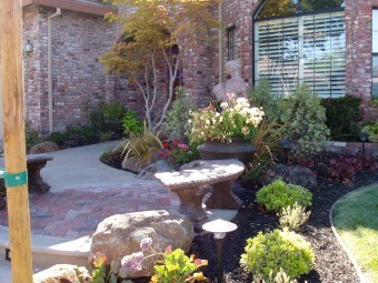 Sacramento residential front yard make-over included a new walkway with lighted steps