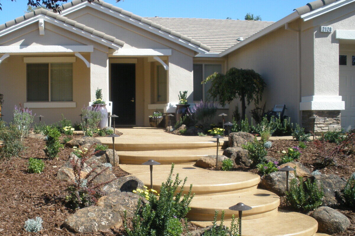 Transform your front yard with a stunning curved stamped concrete walkway