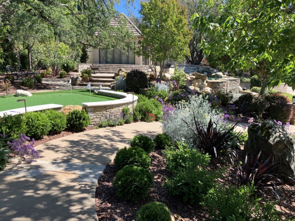 Retaining wall and putting green